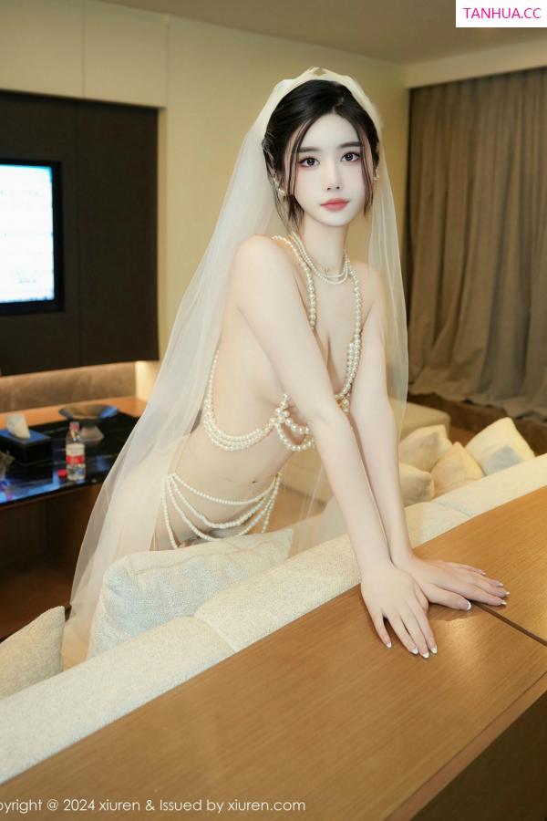   [XiuRen]高清写真图 2024.12.27 No.9674 Erikaki 情趣婚纱第3张图片